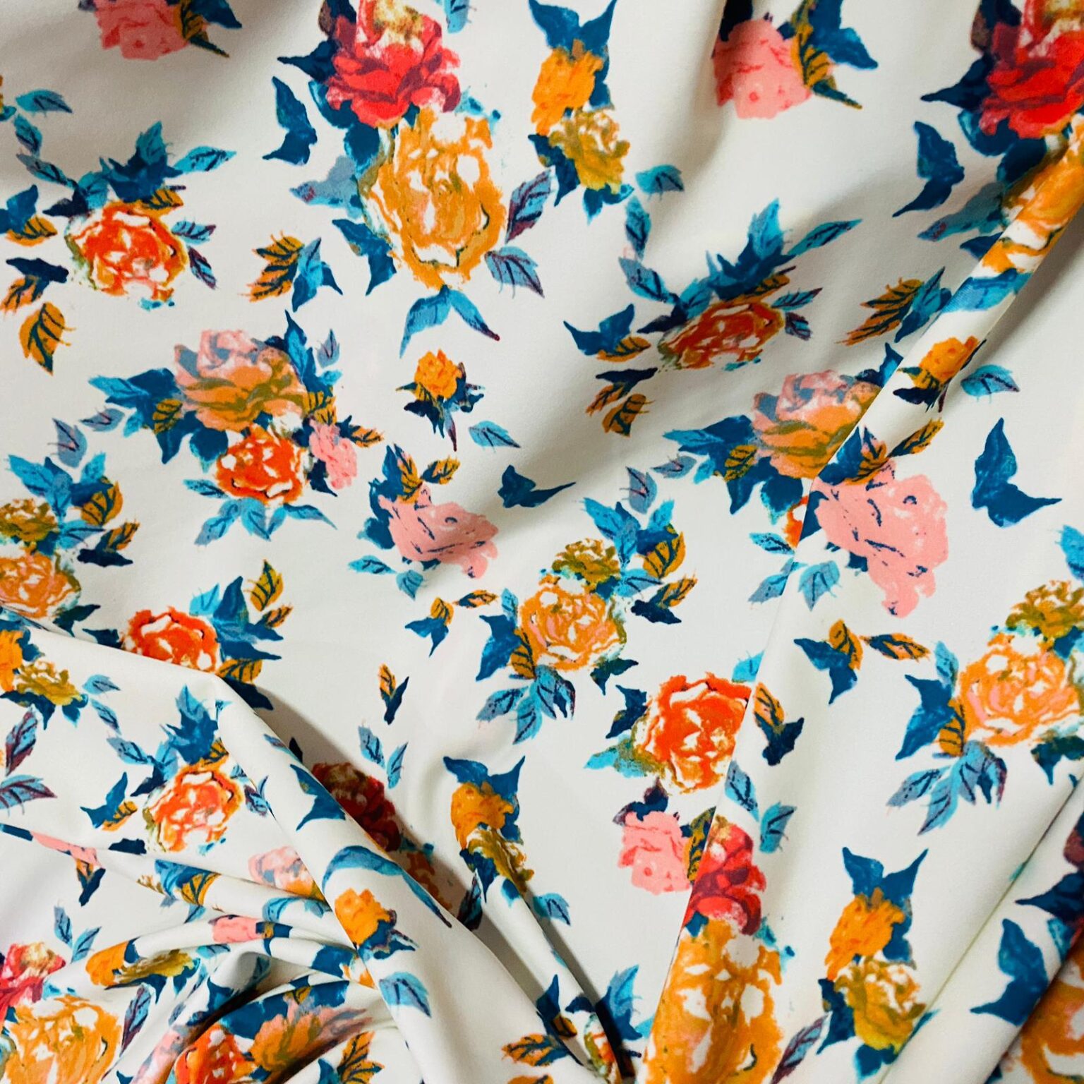 Orange and Pastel colors flowers print on white background Nylon Lycra